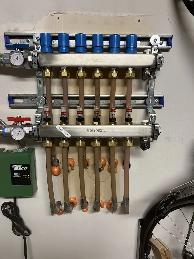 Plumber performing Gas Line Installation at a residential property in Linton Hall